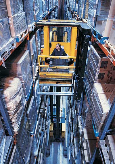 forklift operator in warehouse facility