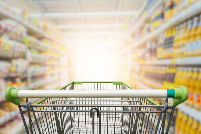 grocery cart in store aisle