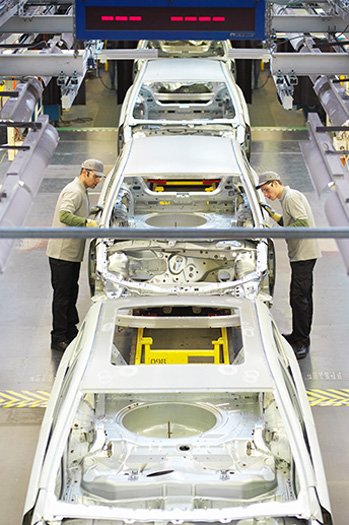 auto assembly line workers